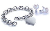 Jewelry set with diamonds, gemstones, and pearls